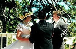 bride and groom exchanging vows at their inclusive wedding.